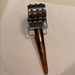 Vintage meat tenderizer bakelite handle